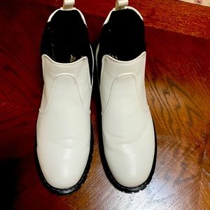 White  ankle boots, black heels